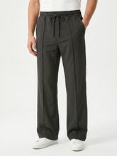Obsidian Tapered Pleat Trouser — Jet Black
