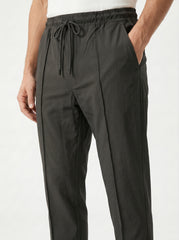 Obsidian Tapered Pleat Trouser — Jet Black